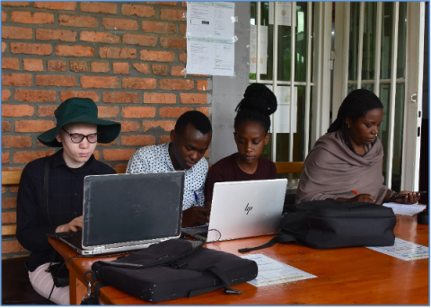 Ms. Bertine Iradukunda (left with glasses) doing group work with her classmates (photo/Vedaste) at INES-Ruhengeri