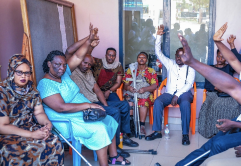 Voters from people with disabilities before casting their votes at the polling site to vote a member of parliament to represent persons with disabilities in the Chamber of Deputies, in Nyarugenge District